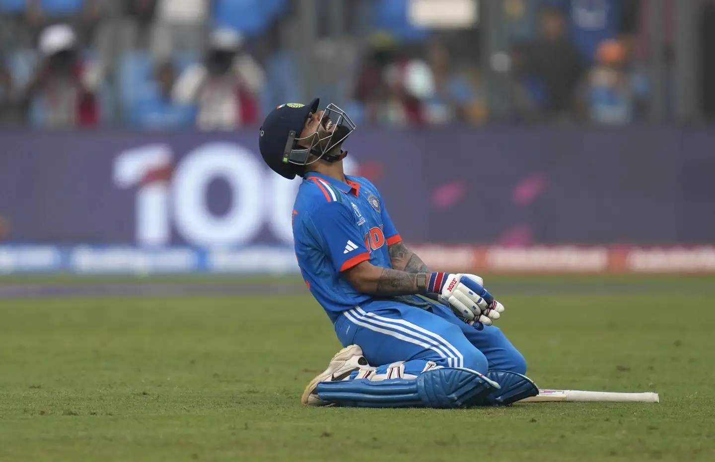 India’s Virat Kohli celebrates his century during the ICC Men’s Cricket World Cup first semifinal match between India and New Zealand in Mumbai, India.
